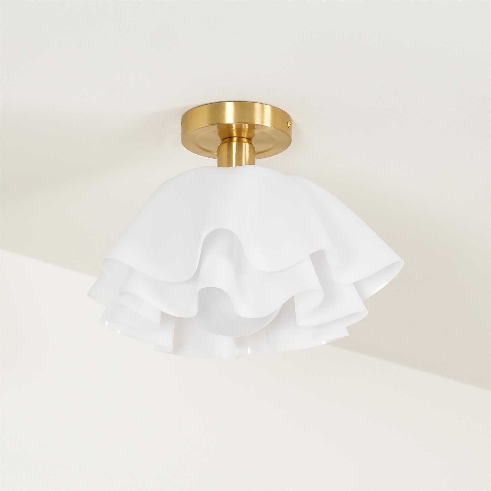 Seen from below on a cream ceiling, the Clérachic Pleated Petal Ceiling Light shows three ruffled tiers and the bulb tucked inside.