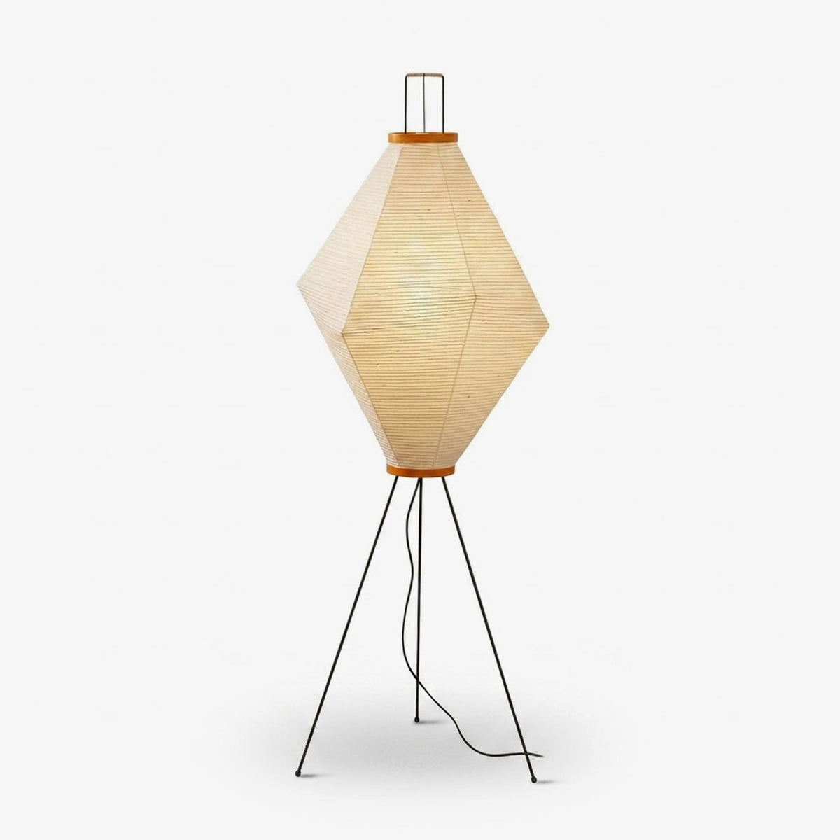 Clérachic diamond-shaped paper floor lamp on a white background, showing its faceted pleated shade, burnt-orange trim rings and black wire tripod base.