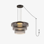 Product view of this Clérachic pendant in smoke-grey glass, two tiers stacked with the plug and cord shown.