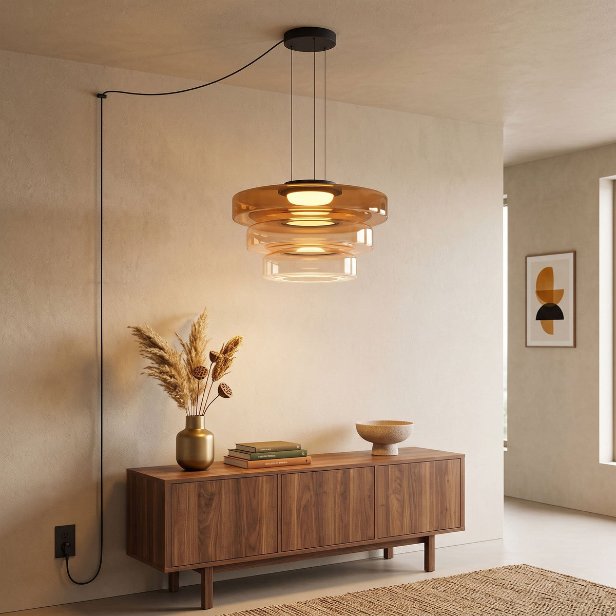 In an entryway, this Clérachic pendant in amber glass hangs above a walnut sideboard.