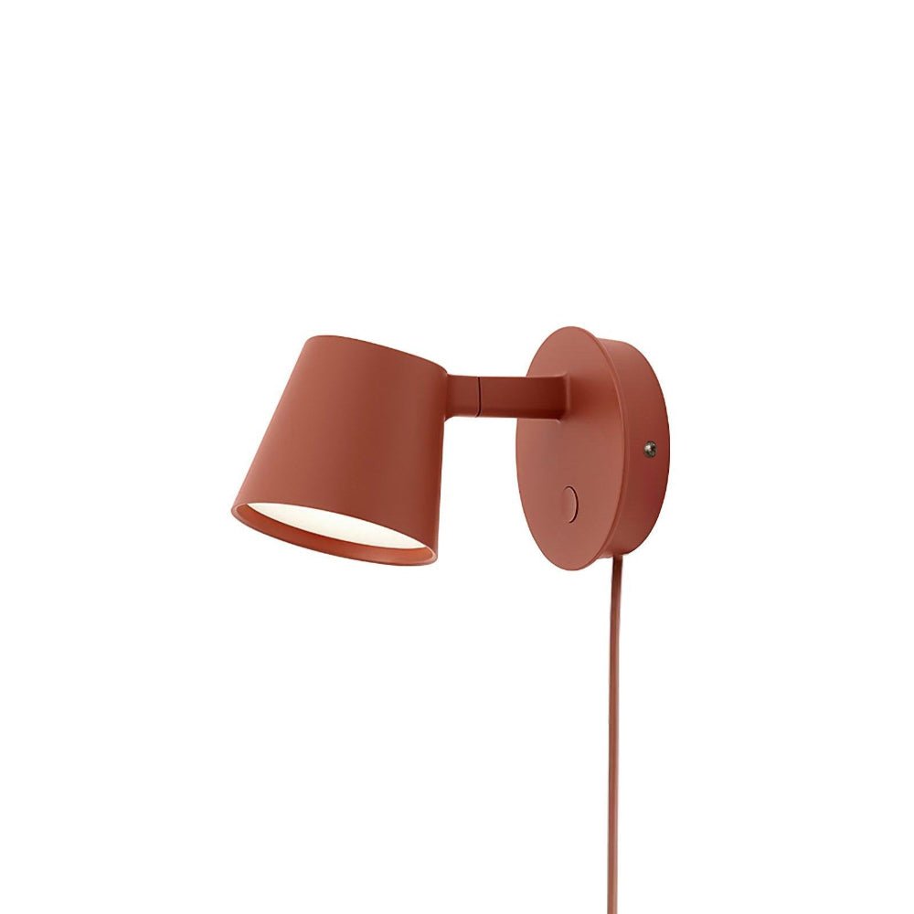 Red Clérachic wall light with a matching red cord, shown against a plain white background.