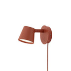 Red Clérachic wall light with a matching red cord, shown against a plain white background.
