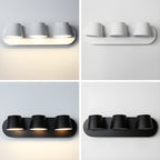 Four views of the three-light Clérachic wall light, white on the top row and black on the bottom, on grey and white backdrops.