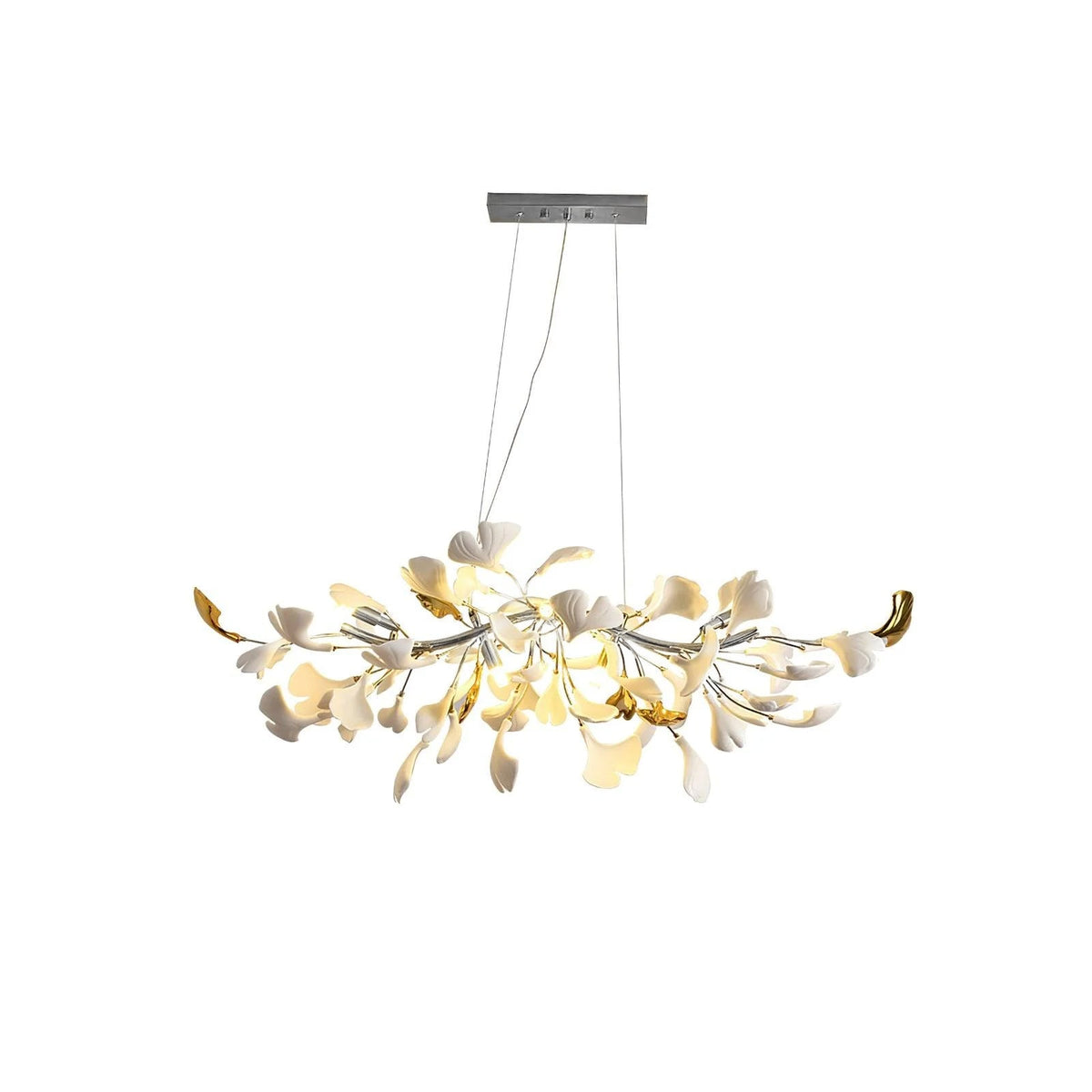 Lit Clérachic chandelier with a silver-toned canopy and branch, its white and gold-tinged leaves glowing on a plain white backdrop.