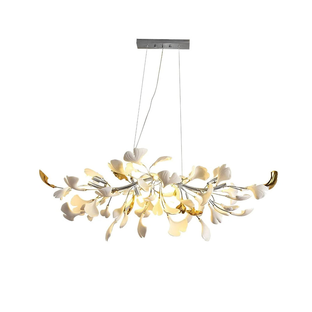 Clérachic leaf chandelier on a silver-toned canopy, white leaves with gold-coloured tips lit, on a plain white backdrop.