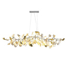 Wide Clérachic chandelier with a silver canopy, white leaves and gold-coloured leaf tips, shown whole and lit on a white backdrop.