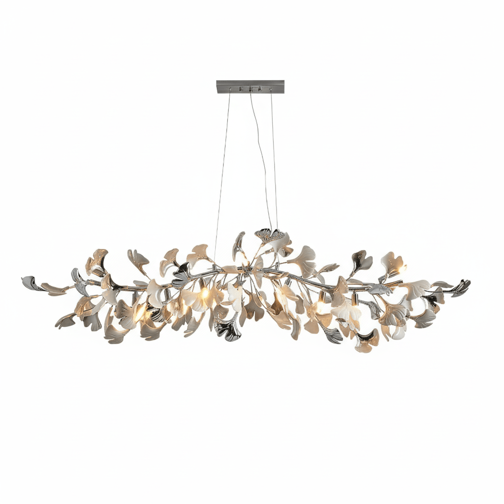 Wide Clérachic chandelier with polished silver leaf tips among white leaves, lit, hanging from a nickel canopy on a white backdrop.