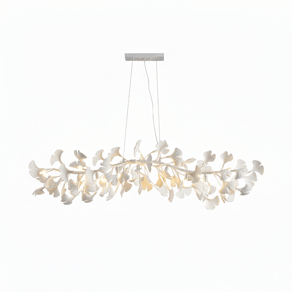 Full-width Clérachic chandelier of white ginkgo leaves, lit and hung from a nickel canopy on a plain white backdrop.