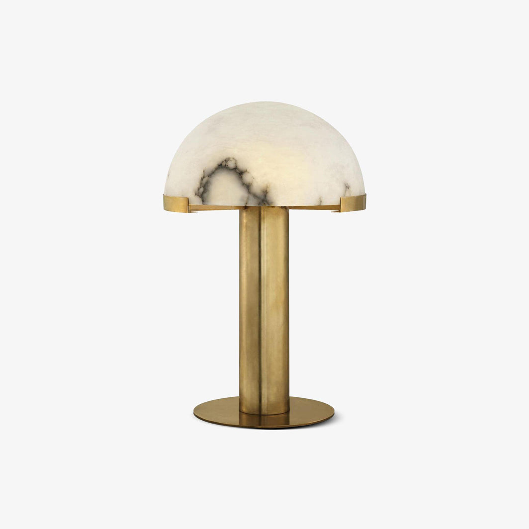 Clérachic alabaster table lamp with a gold stem and base, its white veined dome seated on a plain light backdrop.