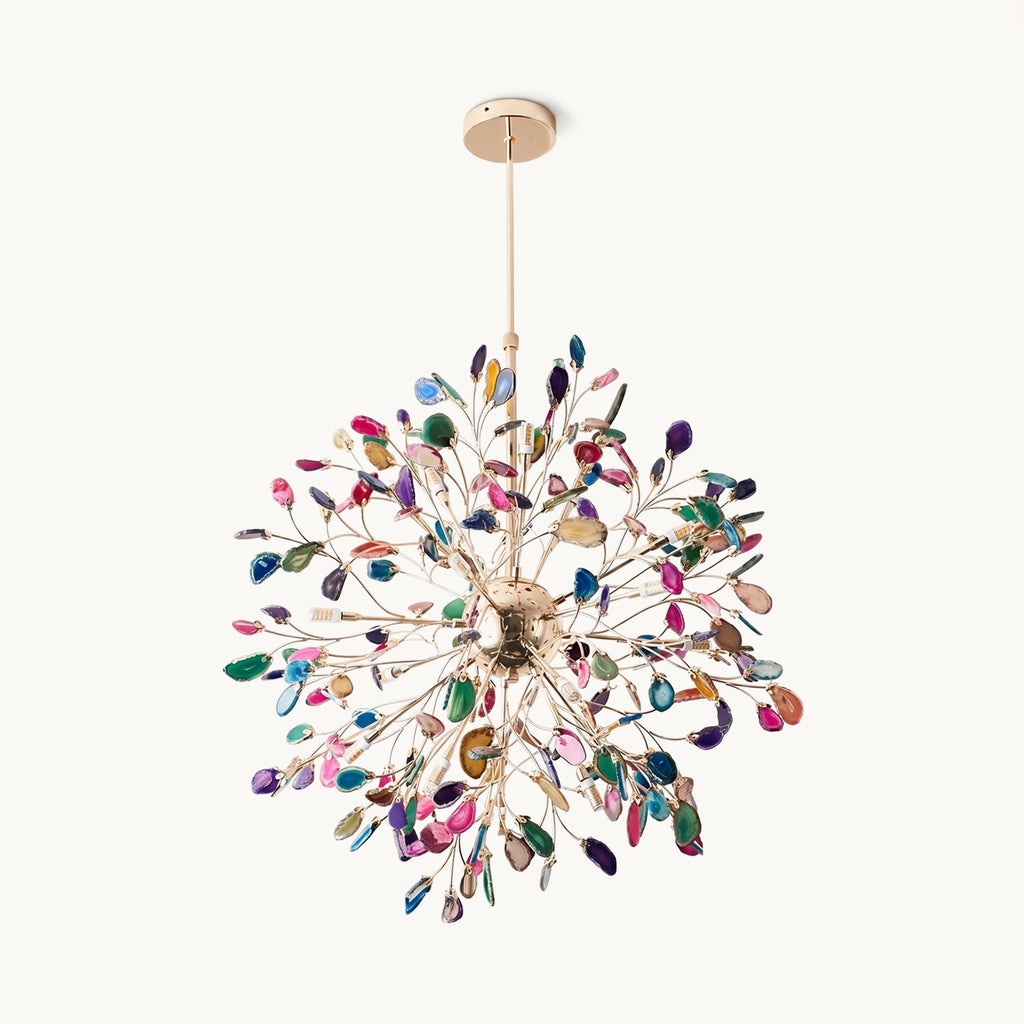 This Clérachic chandelier on a plain backdrop: a round burst of fine gold branches tipped with multicolour agate slices, hung from a slim rod.