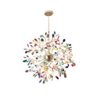 Clérachic agate chandelier with multicolour slices on a plain white backdrop, hanging from a slim gold rod and round canopy.