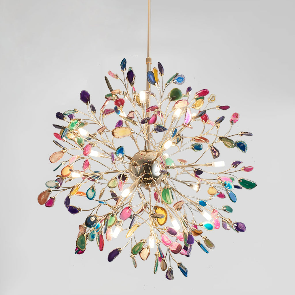 Multicolour agate Clérachic chandelier on a pale grey backdrop, with a gold sphere and branches radiating in all directions.