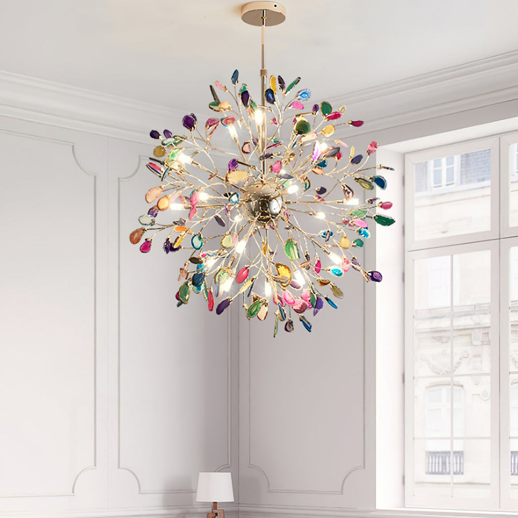 Clérachic agate chandelier beside tall white-framed windows, with grey panelled walls and the edge of a table lamp below.