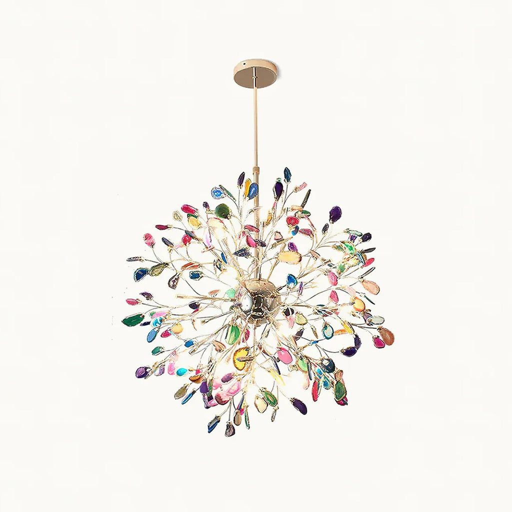 Multicolour agate Clérachic chandelier on a plain white backdrop, with slices in many colours around a gold centre.