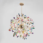 Lit multicolour Clérachic agate chandelier on a grey backdrop, with a gold rod and branches spreading in a full sphere.