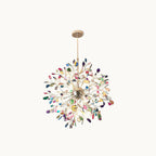 A smaller multicolour Clérachic agate chandelier on a white backdrop, shown with a slim gold rod and round canopy.