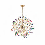 Multicolour agate Clérachic chandelier hanging from a gold chain on a white backdrop, with slices in many colours.
