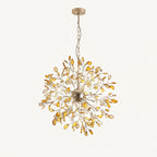 Amber agate Clérachic chandelier hanging from a chain on a cream backdrop, with honey-coloured slices around a gold sphere.