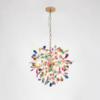 A small multicolour Clérachic agate chandelier on a gold chain, with slices in orange, green, pink and blue on a pale backdrop.