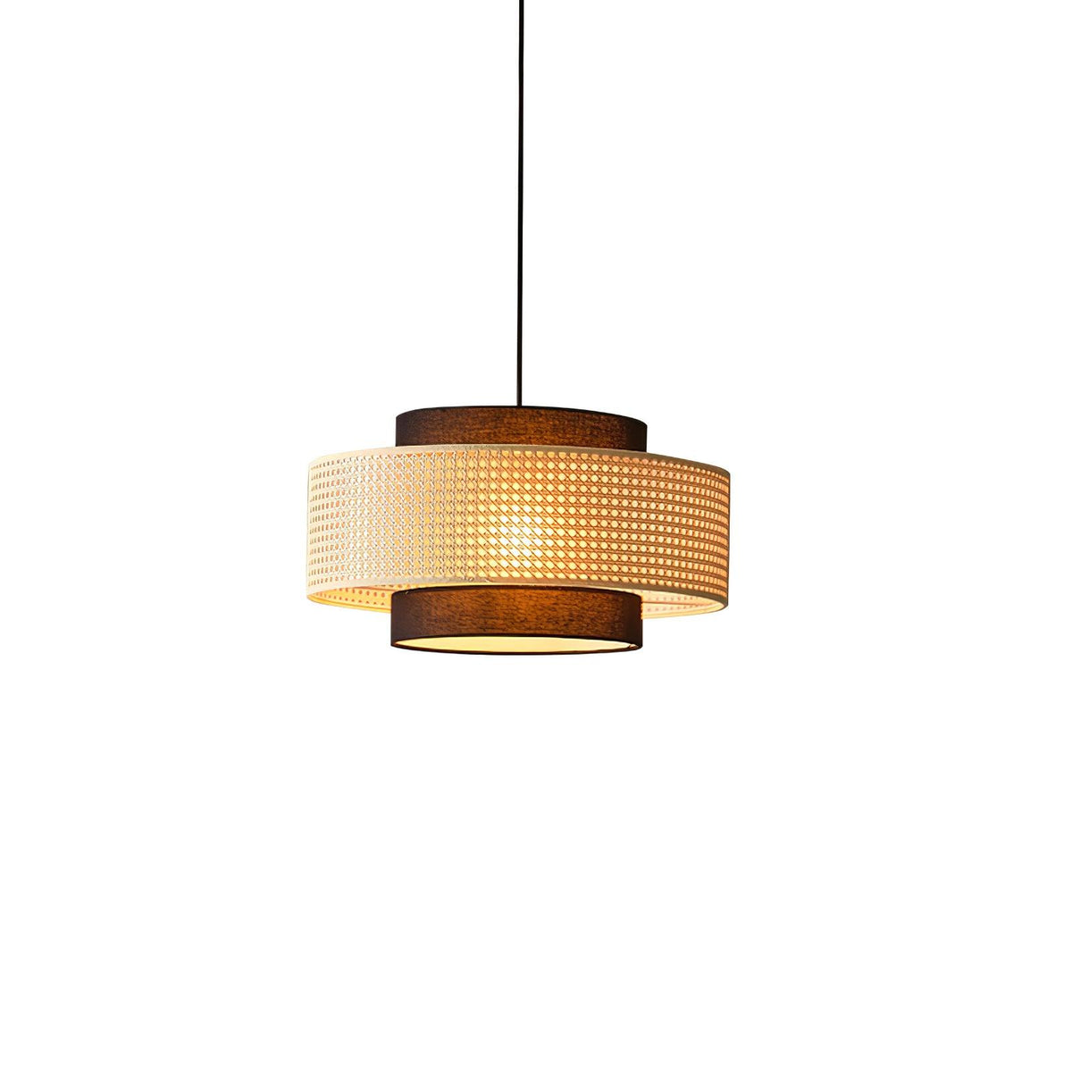 A slightly larger view of the Clérachic pendant, with the cane drum glowing warmly and a black cord above.