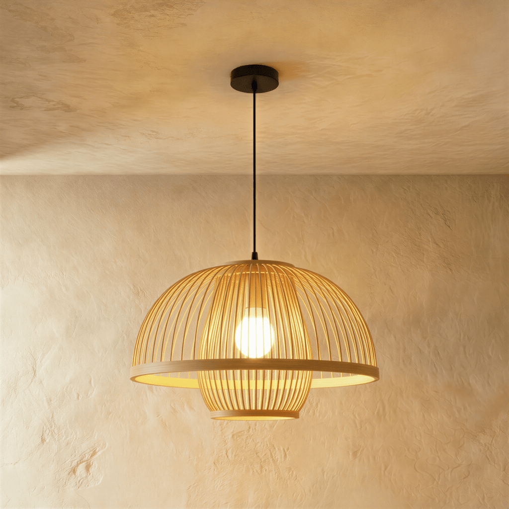 Clérachic large slatted dome pendant light with a broad rim ring and lower cage, bulb glowing, on a black cord.