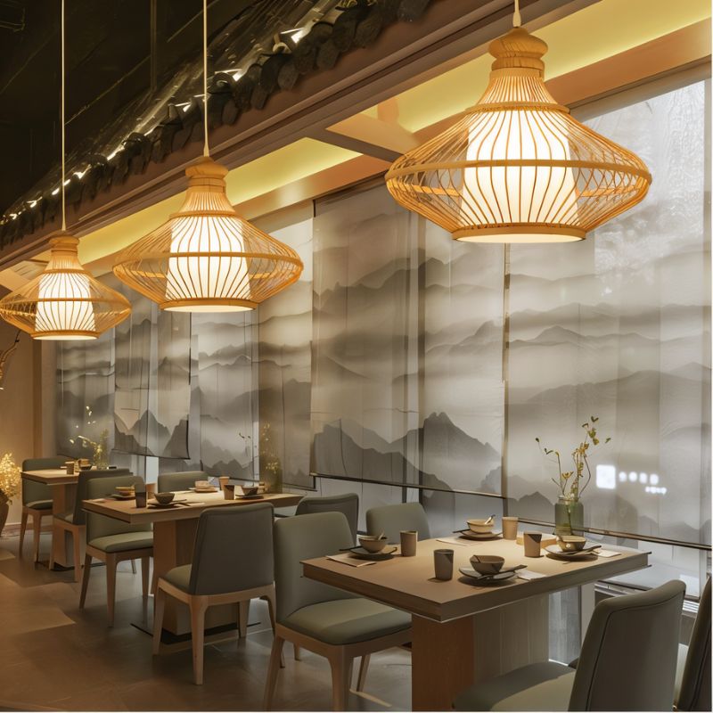 Clérachic flared slatted pendant lights with white inner shades hanging in a restaurant dining room by misty mountain panels.