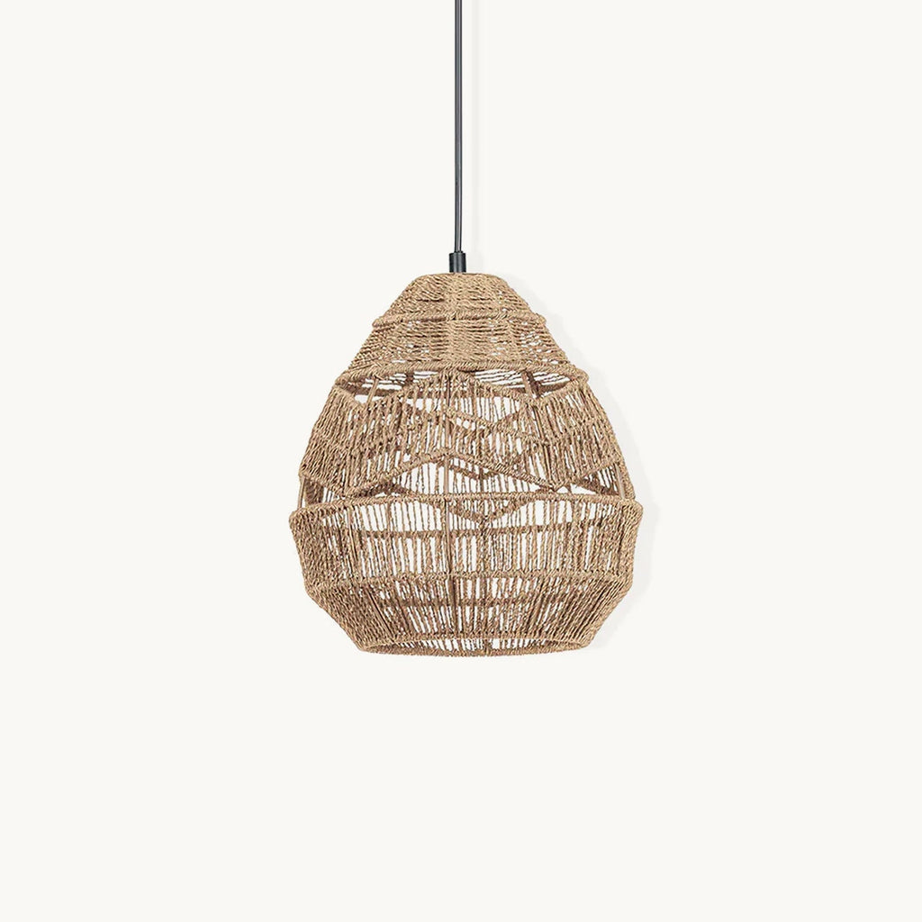 Natural woven rattan teardrop pendant from Clérachic on a black cord, shown on a plain off-white backdrop.
