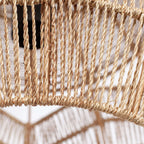 Close view of the twisted natural rope strands around the lower rim of this Clérachic pendant.