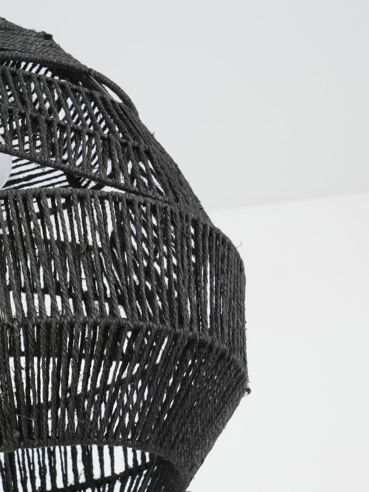 Close view of the black rope bands on the side of this Clérachic pendant shade.