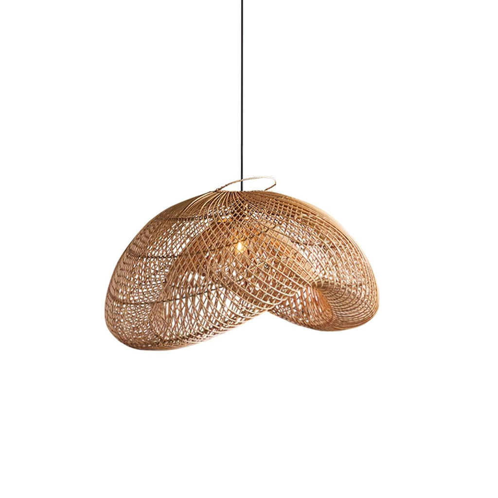 This Clérachic rattan pendant on white from a lower angle, its crossing cane strands curling into a wave with a wire ring on top.
