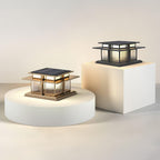 Clérachic Ray pillar lights displayed on pale plinths, one frosted and one ribbed.