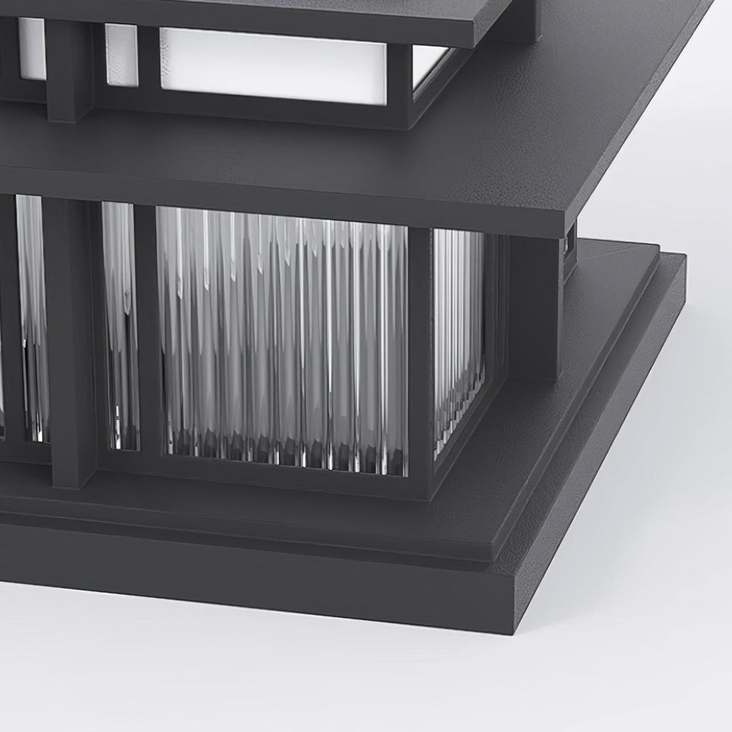 Close view of the Clérachic Ray lantern corner, fluted glass rods behind the black frame.