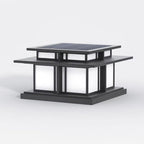 The Clérachic Ray pillar light in frosted glass, solar cells visible across the top.