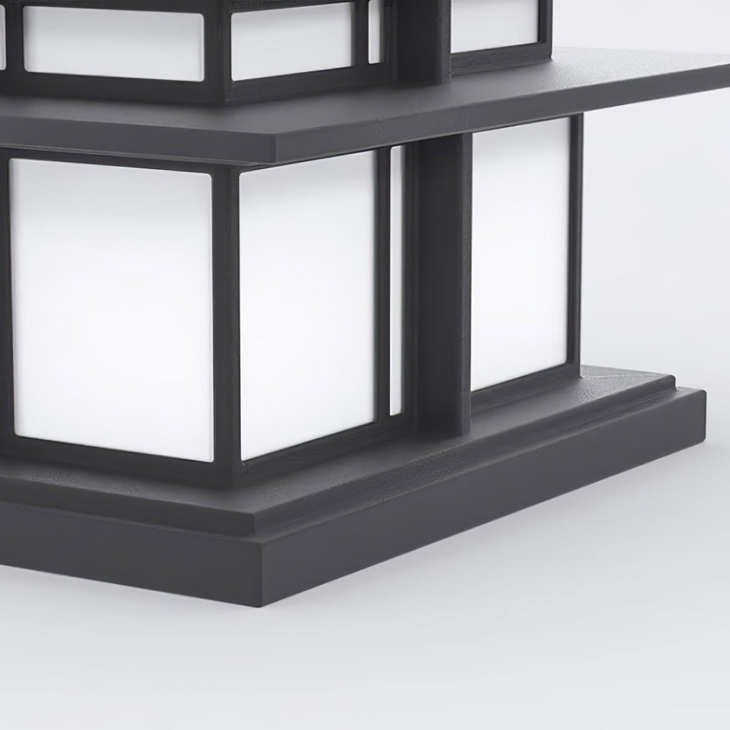 Close detail of the Clérachic Ray base, frosted panels meeting the stepped black plinth.