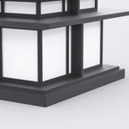 Close detail of the Clérachic Ray base, frosted panels meeting the stepped black plinth.