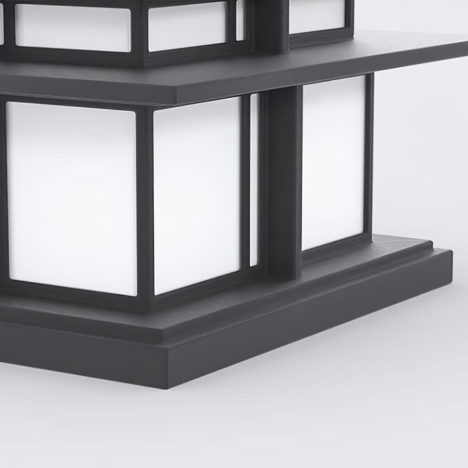 Close detail of the Clérachic Ray base, frosted panels meeting the stepped black plinth.