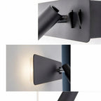 Close crops of the Clérachic black reading wall light showing its two small switches, backplate edge and the glow behind the plate.
