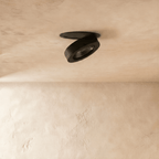Clérachic recessed downlight in black, switched off and seen from the side, with the dark reflector cone set deep inside the head ring.