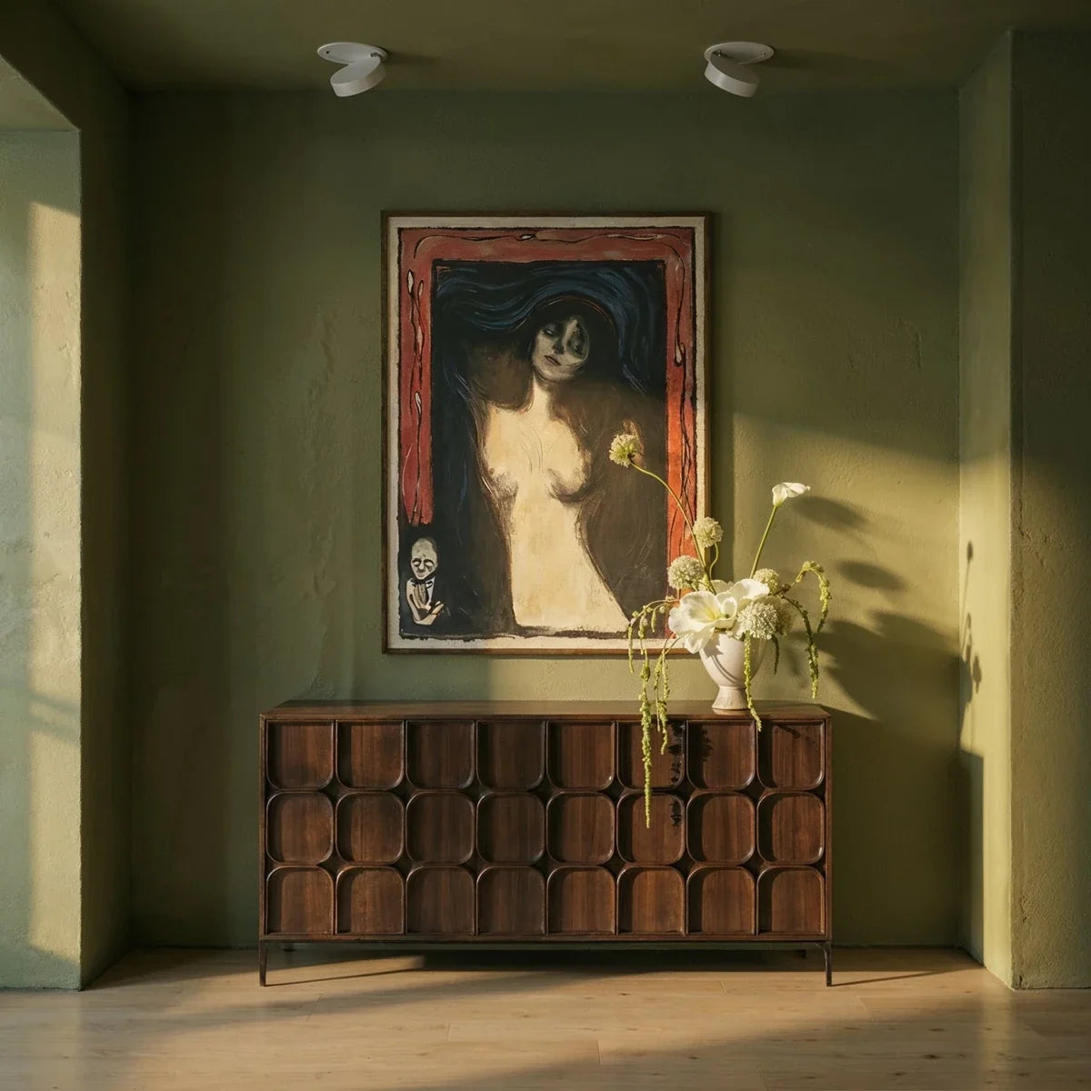 Clérachic recessed downlights in white, two units switched off in a daylit green-walled room above a carved wood sideboard and a framed portrait.