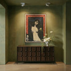 Clérachic recessed downlights in white, the same pair switched on to wash warm light across the framed portrait and the sideboard beneath it.