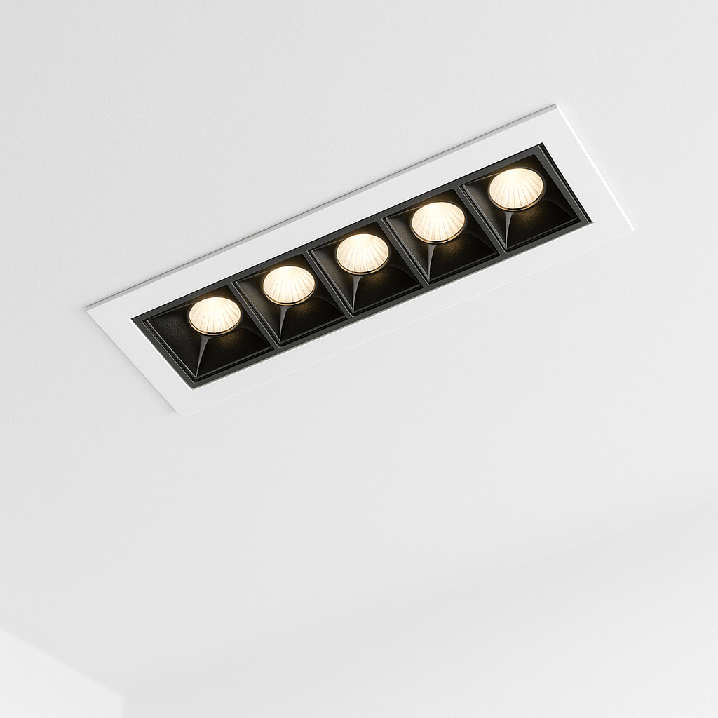 Clérachic five-head recessed linear downlight, lit with warm light from each square black reflector in a white ceiling trim.