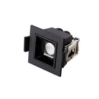 Clérachic single-head recessed square downlight in a black trim with spring clips at the side, on white.