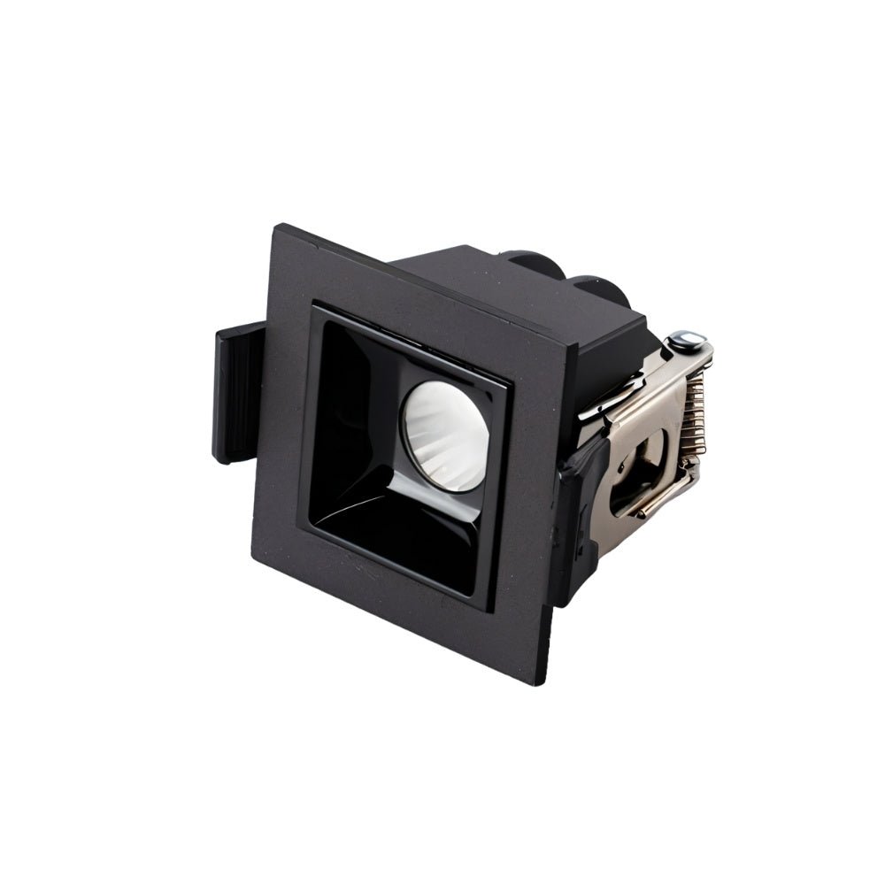 Clérachic single-head recessed square downlight in a black trim with spring clips at the side, on white.