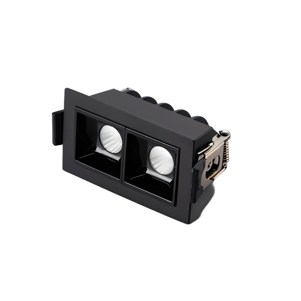 Clérachic two-head recessed downlight in a black trim with square reflectors and a metal spring clip, on white.