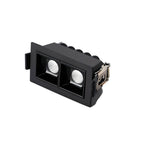 Clérachic two-head recessed downlight in a black trim with square reflectors and a metal spring clip, on white.
