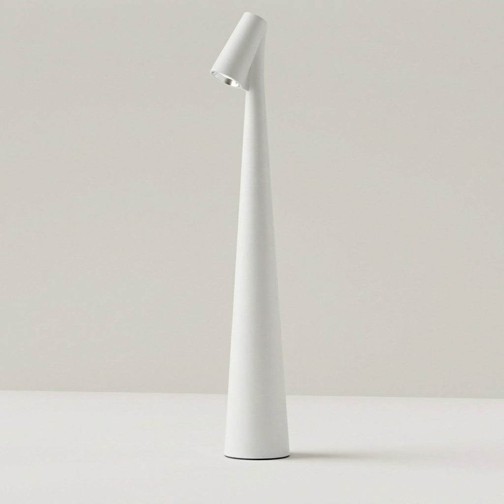 The Clérachic cone desk lamp in white, showing the slim tapered profile on a pale surface.