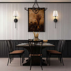 Clérachic pair of black wall sconces with white fabric shades on a panelled wall above a dark dining table and chairs.