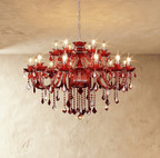 Clérachic eighteen-light red crystal chandelier glowing with candle-style bulbs, two tiers of arms and long faceted drops.