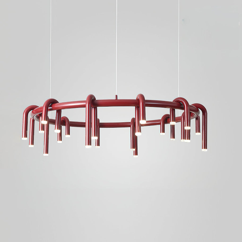 Red Clérachic ring chandelier on a pale grey backdrop, shown from the side with the lower tier of heads visible.