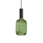 Tall green reeded glass shade from Clérachic with a black fitting, shown against a plain white backdrop.